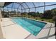 Cool off in this screened in pool, perfect for relaxing and entertaining outdoors at 30035 Alder Rd, Punta Gorda, FL 33982