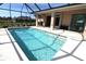 Enjoy this refreshing screened in pool with an adjacent covered patio, perfect for outdoor living at 30035 Alder Rd, Punta Gorda, FL 33982