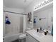 Clean bathroom with updated fixtures, vanity and tub/shower combination at 3213 Belleville Ter, North Port, FL 34286