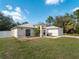 Beautiful home with a well-kept lawn and a charming blue front door at 3213 Belleville Ter, North Port, FL 34286