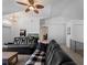 Cozy living room featuring vaulted ceilings, neutral paint, and large comfortable seating at 3213 Belleville Ter, North Port, FL 34286