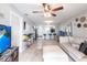 Open concept living area flowing into the kitchen, featuring stylish decor and ample space at 3310 Loveland Blvd # 1808, Punta Gorda, FL 33980
