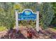Punta Gorda Isles sign welcomes you to a beautiful waterfront community at 3601 Whippoorwill Blvd, Punta Gorda, FL 33950
