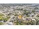 Aerial view of a waterfront community with single-Gathering homes and canals winding throughout the neighborhood at 3627 Easy St, Port Charlotte, FL 33952