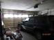 Spacious garage featuring a vehicle and ample storage space for your convenience at 3813 S Cranberry Blvd, North Port, FL 34286