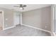 Comfortable bedroom with ceiling fan and large closet for storage at 3841 Cinderella Rd, North Port, FL 34286