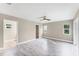 Bright bedroom with tile flooring, closet and windows providing natural light at 3841 Cinderella Rd, North Port, FL 34286
