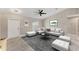 Cozy living room featuring neutral colors, comfortable seating, and modern decor at 3841 Cinderella Rd, North Port, FL 34286