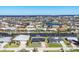 Scenic aerial view of waterfront homes with canals and beautiful blue waters at 430 Capri Isles Ct, Punta Gorda, FL 33950