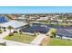 Aerial view showcasing a home near canals in a beautiful waterfront community at 430 Capri Isles Ct, Punta Gorda, FL 33950