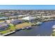 Beautiful waterfront homes with private docks line the canals in this sunny, coastal community at 430 Capri Isles Ct, Punta Gorda, FL 33950