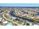 Scenic aerial view of waterfront homes with canals and beautiful blue waters at 430 Capri Isles Ct, Punta Gorda, FL 33950