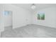 Bright bedroom featuring tile flooring, closet, neutral walls and natural lighting at 4818 Kiska Rd, North Port, FL 34288