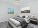 This bedroom is decorated with white walls, a comfortable bed, and modern furniture, creating a peaceful retreat at 4818 Kiska Rd, North Port, FL 34288