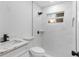 Modern bathroom featuring a tiled shower, stylish vanity, and contemporary fixtures at 6534 29Th N Way, St Petersburg, FL 33702