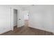 Bright bedroom featuring wood-look floors and a closet for ample storage space at 6534 29Th N Way, St Petersburg, FL 33702