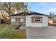 Charming home features a well-manicured lawn and freshly painted exterior at 6534 29Th N Way, St Petersburg, FL 33702
