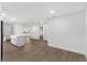 Open-concept living area with neutral walls and floors and plenty of natural light at 6534 29Th N Way, St Petersburg, FL 33702