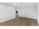 Open-concept living room with hardwood floors and minimalist design at 6534 29Th N Way, St Petersburg, FL 33702