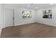 Bright living room featuring hardwood floors and large windows at 6534 29Th N Way, St Petersburg, FL 33702