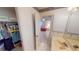Bathroom with a sink, walk-in closet, and a view into the bedroom at 7534 Carissa, Punta Gorda, FL 33955