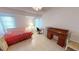 Spacious bedroom featuring neutral tile flooring and an abundance of natural light at 7534 Carissa, Punta Gorda, FL 33955