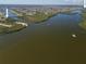 Wide aerial shot showcasing the vast waterway and beautiful waterfront community at 9149 Lane Ct, Port Charlotte, FL 33981