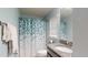 Modern bathroom with shower and granite countertop at 10052 Winding River Rd, Punta Gorda, FL 33950