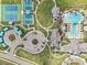 An aerial view displays community amenities: tennis courts, swimming pools, and recreation center at 10112 Canaveral Cir, Sarasota, FL 34241