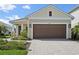 Charming home featuring a spacious driveway and well-maintained landscaping at 10112 Canaveral Cir, Sarasota, FL 34241