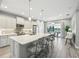 Bright, updated kitchen featuring a center island, stainless steel appliances, and ample counter space at 10112 Canaveral Cir, Sarasota, FL 34241