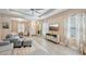 Bright, open-concept living room with modern finishes, stylish furniture, and plenty of space at 10112 Canaveral Cir, Sarasota, FL 34241