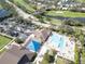 Community pool, outdoor gathering spaces, and manicured landscaping for outdoor enjoyment at 13096 N Marsh Dr, Port Charlotte, FL 33953