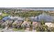 Aerial view of homes situated along a lakefront community at 13096 N Marsh Dr, Port Charlotte, FL 33953