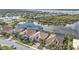 Overhead view of a lovely lakeside community with lush greenery and tranquil waters at 13096 N Marsh Dr, Port Charlotte, FL 33953