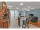 Spacious kitchen with breakfast bar opens to living room at 13096 N Marsh Dr, Port Charlotte, FL 33953