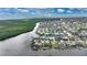 Stunning aerial view of a waterfront property in a charming residential neighborhood at 1336 Casey Key Dr, Punta Gorda, FL 33950