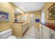 Guest bathroom featuring a shower, granite countertops, tile flooring and ample storage at 1336 Casey Key Dr, Punta Gorda, FL 33950