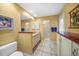 Bathroom featuring modern fixtures, neutral tile, and a glass-enclosed shower with a vanity at 1336 Casey Key Dr, Punta Gorda, FL 33950