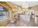 Dining area adjacent to the kitchen boasts great natural lighting and breakfast bar seating at 1336 Casey Key Dr, Punta Gorda, FL 33950