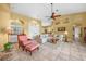 Spacious living room with tile flooring, a comfortable seating arrangement, and an open floor plan at 1336 Casey Key Dr, Punta Gorda, FL 33950