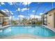 Relaxing screened-in pool area with a waterfront view offers the perfect retreat at 1336 Casey Key Dr, Punta Gorda, FL 33950