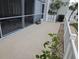 Spacious patio surrounded by lush greenery, perfect for outdoor entertaining at 1340 San Cristobal Ave # 207, Punta Gorda, FL 33983