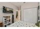 Bedroom view featuring a wall-mounted television, closet and built-in shelving at 1355 Red Oak Ln, Port Charlotte, FL 33948