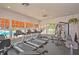 Well-equipped gym with treadmills, elliptical machines, and weight training equipment, offering residents a convenient fitness option at 1355 Red Oak Ln, Port Charlotte, FL 33948