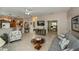 Open floor plan with living room view of kitchen and dining area, complete with modern furnishings at 1355 Red Oak Ln, Port Charlotte, FL 33948