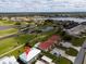 Aerial view of the community with golf course and water features at 1356 Rio De Janeiro Ave # 107, Punta Gorda, FL 33983