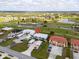 Aerial view of the community with golf course and water features at 1356 Rio De Janeiro Ave # 107, Punta Gorda, FL 33983