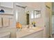 Bathroom featuring a single sink vanity with a large mirror and decor at 1474 Red Oak Ln, Port Charlotte, FL 33948
