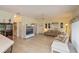 Spacious open floor plan with tile floors, ceiling fan, and great natural light throughout at 1474 Red Oak Ln, Port Charlotte, FL 33948